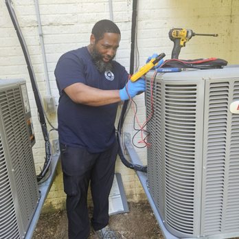 Logan Mechanical - Technician running the diagnostic - Heating & Air Conditioning/HVAC Near Me - Clinton, Maryland Logan Mechanical - Technician running the diagnostic - Heating & Air Conditioning/HVAC Near Me - Clinton, Maryland