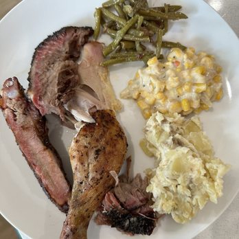 Evie Mae’s - Chicken, brisket, ribs, pulled pork, potato casserole, corn, and green beans - Caribbean Near Me - Miramar Beach, Florida