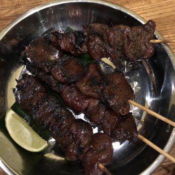 Thip Khao - Piing Hua Jai Kai - grilled chicken hearts, fermented shellfish, lime ($11) - Laotian Near Me - Washington, DC, District of Columbia Thip Khao - Piing Hua Jai Kai - grilled chicken hearts, fermented shellfish, lime ($11) - Laotian Near Me - Washington, DC, District of Columbia