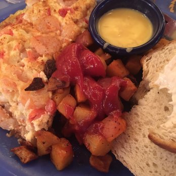 Over Easy Cafe - Shrimp and mushroom omelette with home fries and toast ... the absolute best! - Breakfast & Brunch Near Me - Sanibel, Florida Over Easy Cafe - Shrimp and mushroom omelette with home fries and toast ... the absolute best! - Breakfast & Brunch Near Me - Sanibel, Florida