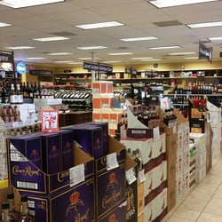Spec's Wines, Spirits & Finer Foods - Neatly stacked merchandise