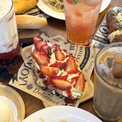 September - Fresh Strawberry croffle (middle), fresh watermelon lychee tea (top right), garlic creamcheese croissant (top right), viet coffee, spaghetti