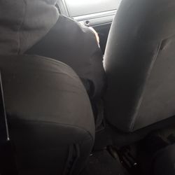 Always Ready Car Service - Seat leaned all the way back and you can see the top of his phone...in hand.