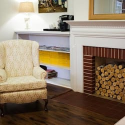 Moorehead Dentistry - Reception area with a cozy and comfortable feel. Help yourself to a hot or cold beverage while you watch a little TV.