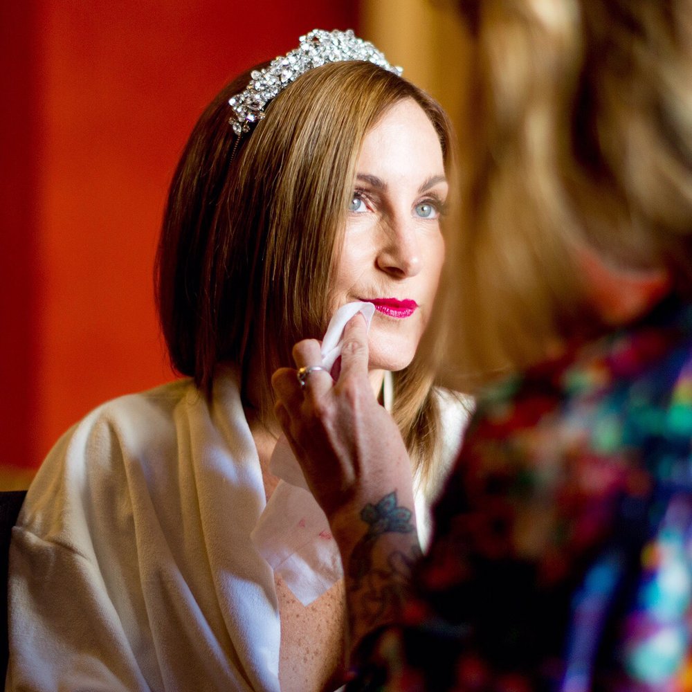 Katie doing my makeup on my wedding day.