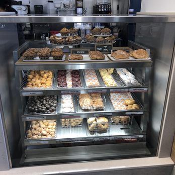 Dunkin' -  a display case filled with various pastries - Coffee & Tea Near Me - Boston, Massachusetts
