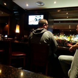 two men sitting at the bar two men sitting at the bar