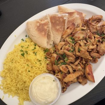 Pita Shop - Chicken Shawarma Platter with Yellow rice and Pita bread - Mediterranean Near Me - Miramar, Florida Pita Shop - Chicken Shawarma Platter with Yellow rice and Pita bread - Mediterranean Near Me - Miramar, Florida