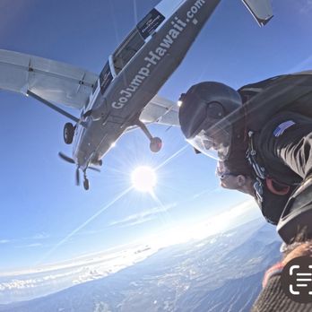 Go Jump - In free fall with the airplane in view - Skydiving Near Me - Waialua, Hawaii Go Jump - In free fall with the airplane in view - Skydiving Near Me - Waialua, Hawaii