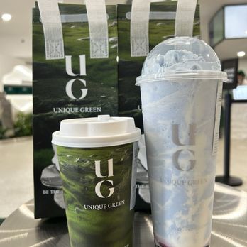 UG Tea - Left: Half off Camellia oolong milk tea. Right: blueberry blizzard smoothie - Bubble Tea Near Me - San Gabriel, California UG Tea - Left: Half off Camellia oolong milk tea. Right: blueberry blizzard smoothie - Bubble Tea Near Me - San Gabriel, California