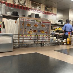 a man and a woman in the kitchen a man and a woman in the kitchen