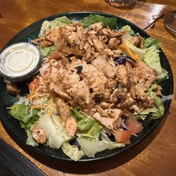 The Goal Line - House salad topped with salmon.