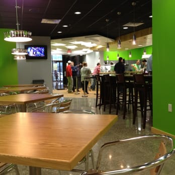 City Greens - a restaurant with tables and chairs - Vegetarian Near Me - New Orleans, Louisiana
