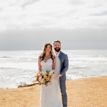 Breezy Day - Bride and groom at Sunset Cliffs - Wedding Planning Near Me