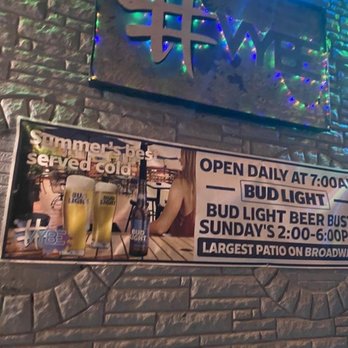 VYBE - a brick wall with a sign for a bar - Gay Bars Near Me - Denver, Colorado VYBE - a brick wall with a sign for a bar - Gay Bars Near Me - Denver, Colorado