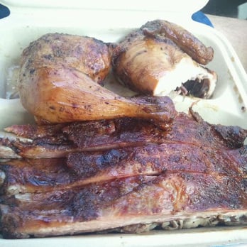 Gorilla Barbeque - 3 item combo-Chicken, ribs, and pulled pork hiding under the ribs - Barbeque Near Me - Pacifica, California