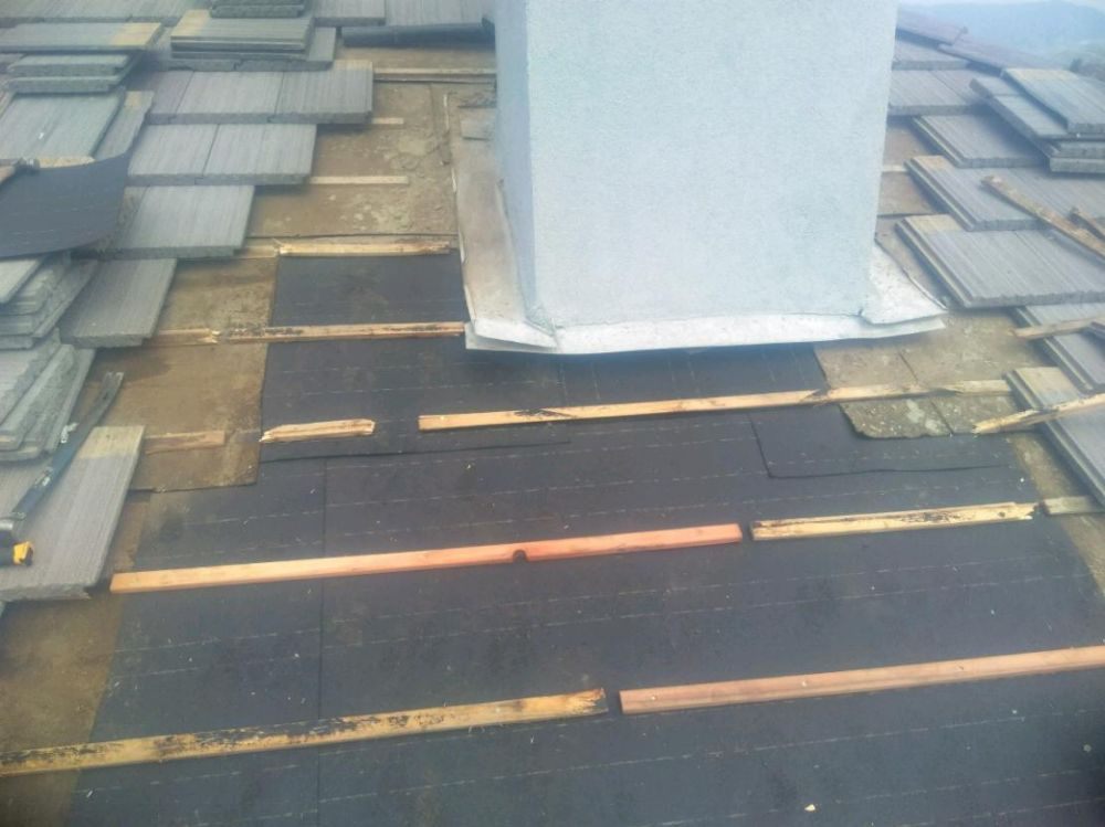 Slide of Earl Bennett Roofing