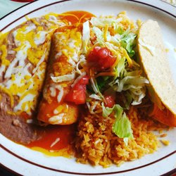 El Compadre Restaurant - One chicken enchilada, one chicken taco, rice and beans!