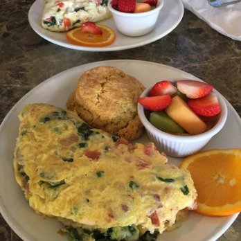 Sage Biscuit Cafe - Garden omelet with biscuit and fruit. Delicious and so much food! - Breakfast & Brunch Near Me - Bradenton, Florida Sage Biscuit Cafe - Garden omelet with biscuit and fruit. Delicious and so much food! - Breakfast & Brunch Near Me - Bradenton, Florida