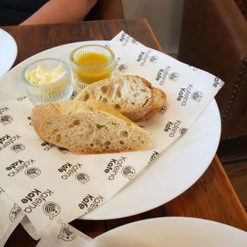 Kafeina Kafe - The side of bread with herb butter,  we finished it all! - Coffee & Tea Near Me - Spring, Texas
