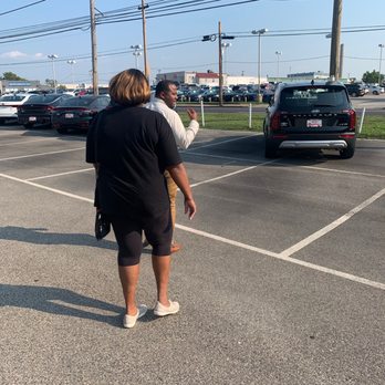 Conicelli Honda - Mom walking to take a glance at the vehicle - Car Dealers Near Me - Conshohocken, Pennsylvania