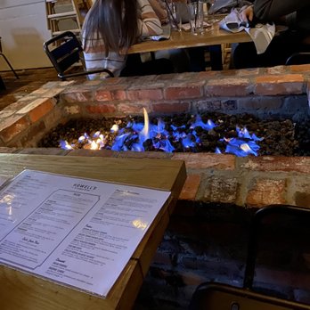 Howell's Kitchen and Bar - Cute and cozy fire pit - Pizza Near Me - Atlanta, Georgia
