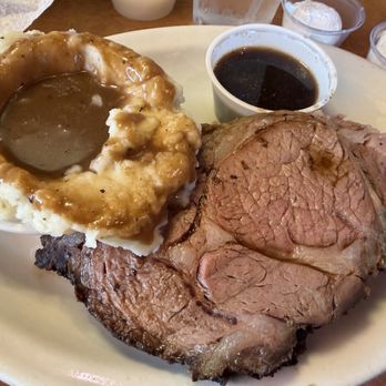 Texas Roadhouse - perfectly cooked tender & juicy 14oz Prime Rib medium with au jus & horseradish dip along with mashed potatoes & delicious brown gravy. - Steakhouses Near Me - Hollywood Park, Texas