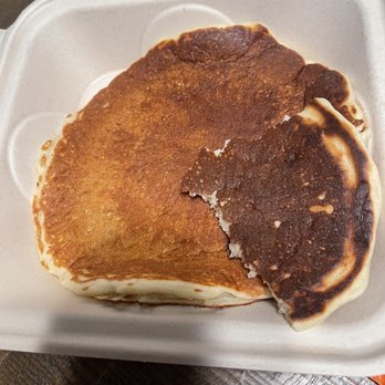 Pilot Light - What is left of the burnt pancake. The rest we had thrown out. - Breakfast & Brunch Near Me - Half Moon Bay, California