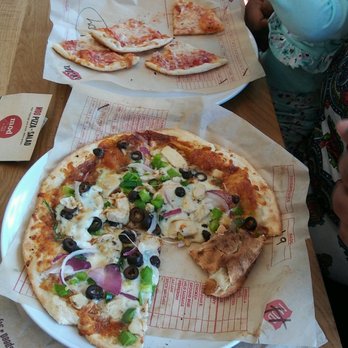 MOD Pizza - Baby loves her Maddy cheese pizza.  Erica's chicken pizza with spinach, olives, onions, garlic, red sauce...oh yum.  We love MOD Pizza! - Pizza Near Me - Long Beach, California