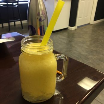 Rommy - Very crappy photo but this is passionfruit smoothie with almond milk and lychee jellies. LOVE the reusable glass jar - Coffee & Tea Near Me - Rochester Hills, Michigan Rommy - Very crappy photo but this is passionfruit smoothie with almond milk and lychee jellies. LOVE the reusable glass jar - Coffee & Tea Near Me - Rochester Hills, Michigan