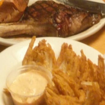Texas Roadhouse - Fort Worth bone in ribeye 20oz and cactus blossom. - Steakhouses Near Me - Goodyear, Arizona Texas Roadhouse - Fort Worth bone in ribeye 20oz and cactus blossom. - Steakhouses Near Me - Goodyear, Arizona