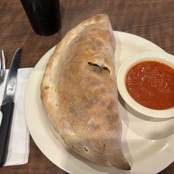 Romano's Pizza - Fantastic Calzone stuffed with cheese, chicken, mushrooms & peppers !!! - Pizza Near Me - Houston, Texas