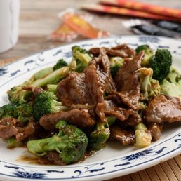 a plate of beef and broccoli a plate of beef and broccoli