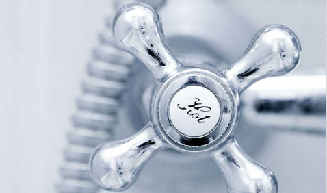 Wolfgang Plumbing and Heating Logo