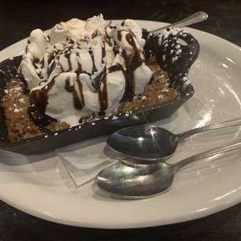 The Beehive Grill - Tropical Chocolate Chunk Skillet cake-crazy good for that price & made fresh! We ordered it right after we got our food. Worth the wait! - Bars Near Me - Logan, Utah The Beehive Grill - Tropical Chocolate Chunk Skillet cake-crazy good for that price & made fresh! We ordered it right after we got our food. Worth the wait! - Bars Near Me - Logan, Utah
