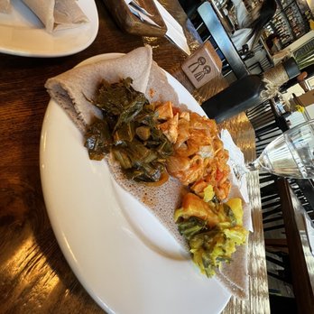 Massawa - Salmon Tebsi (L) W/ Collard Greens W/ Potato Stew - Ethiopian Near Me - New York, New York