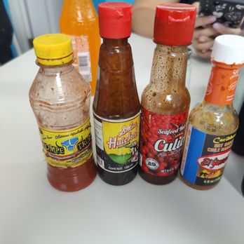 Mariscos El Submarino - Assortment of hot sauces on tables - Seafood Near Me - Jackson Heights, New York Mariscos El Submarino - Assortment of hot sauces on tables - Seafood Near Me - Jackson Heights, New York