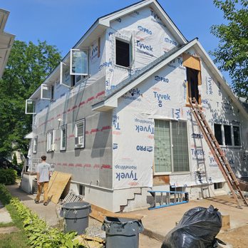 DDP Construction - Exterior of a house in progress, with a new addition to make a second floor. - General Contractors Near Me DDP Construction - Exterior of a house in progress, with a new addition to make a second floor. - General Contractors Near Me