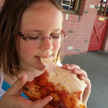 Mr. Wich Deli - My niece devouring her cheese pizza! - Sandwiches Near Me - Ormond Beach, Florida