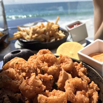 Splashes Restaurant - Calamari and fries with a side of sunshine. - New American Near Me - Laguna Beach, California Splashes Restaurant - Calamari and fries with a side of sunshine. - New American Near Me - Laguna Beach, California