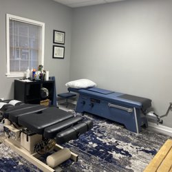 The Village Wellness Center - Adjusting/ traction tables