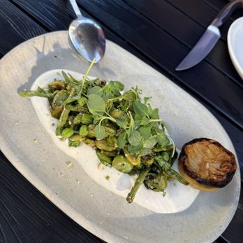 Chaak Kitchen - Superb fava bean, long bean, peas and greens served over a yogurt sauce with charred lemon. So good - Cocktail Bars Near Me - Tustin, California Chaak Kitchen - Superb fava bean, long bean, peas and greens served over a yogurt sauce with charred lemon. So good - Cocktail Bars Near Me - Tustin, California