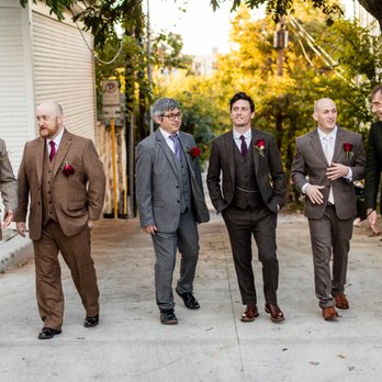 Bykowski Tailor & Garb - The groom in the middle and the groomsmen on the far right wearing Bykowski suits - Bespoke Clothing Near Me - Austin, Texas