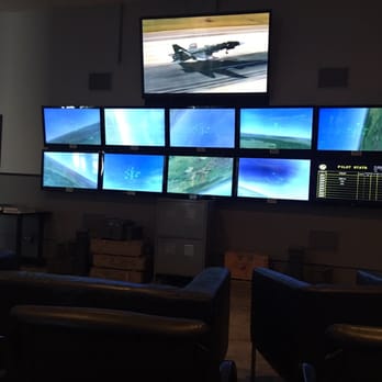 Flightdeck RogueRacing - Screens in the waiting area to watch flights - Arcades Near Me - Anaheim, California Flightdeck RogueRacing - Screens in the waiting area to watch flights - Arcades Near Me - Anaheim, California