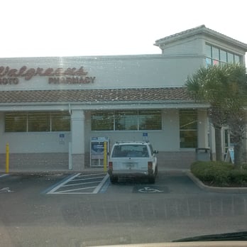 Walgreens - a white truck parked in front of a store - Drugstores Near Me - Daytona Beach, Florida