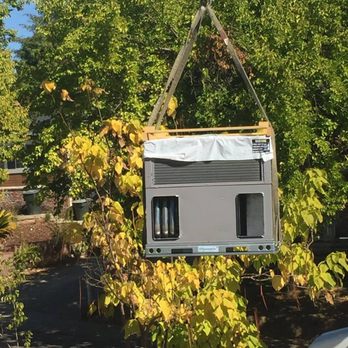 Miller Heating and Air Conditioning - Crane lifting up new ac unit to rooftop - Heating & Air Conditioning/HVAC Near Me Miller Heating and Air Conditioning - Crane lifting up new ac unit to rooftop - Heating & Air Conditioning/HVAC Near Me