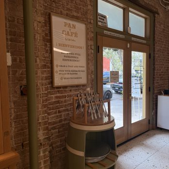 Pan y Cafe - Entrance and tongs for picking bread - Bakeries Near Me - Santa Ana, California