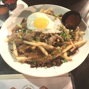 Common Theory - Duck fries w/ duck gravy & a fried egg on top. - Gastropubs Near Me - San Diego, California