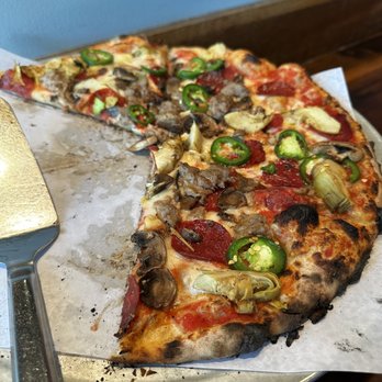 Max and Leo's - Newton - I sometimes forget to take a picture before I dig in. Sausage, pepperoni, mushroom, artichoke and jalapeño pizza. - Pizza Near Me - Newton, Massachusetts Max and Leo's - Newton - I sometimes forget to take a picture before I dig in. Sausage, pepperoni, mushroom, artichoke and jalapeño pizza. - Pizza Near Me - Newton, Massachusetts