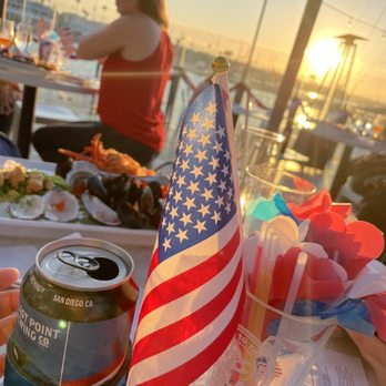 Ballast Point Brewing Long Beach - The table set up for 4th of July, comes with patriotic goodies to celebrate Independence Day! - Breweries Near Me - Long Beach, California Ballast Point Brewing Long Beach - The table set up for 4th of July, comes with patriotic goodies to celebrate Independence Day! - Breweries Near Me - Long Beach, California